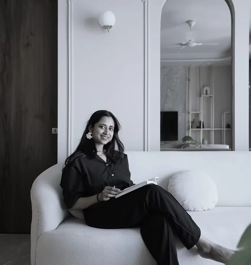 Portrait placeholder for the founder and interior designer